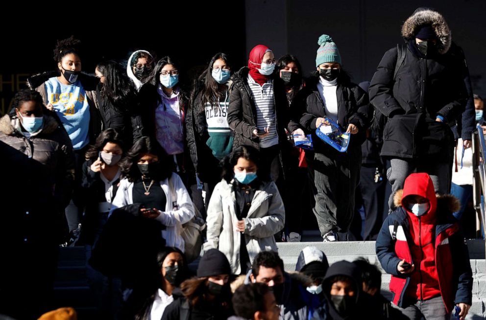 Young people leave the Martin Luther King Jr. Educational Campus as some students in New York City staged a walkout to urge officials to offer remote learning options due to concerns over safety amid the spread of Omicron, in New York City, Jan. 11, 2022.