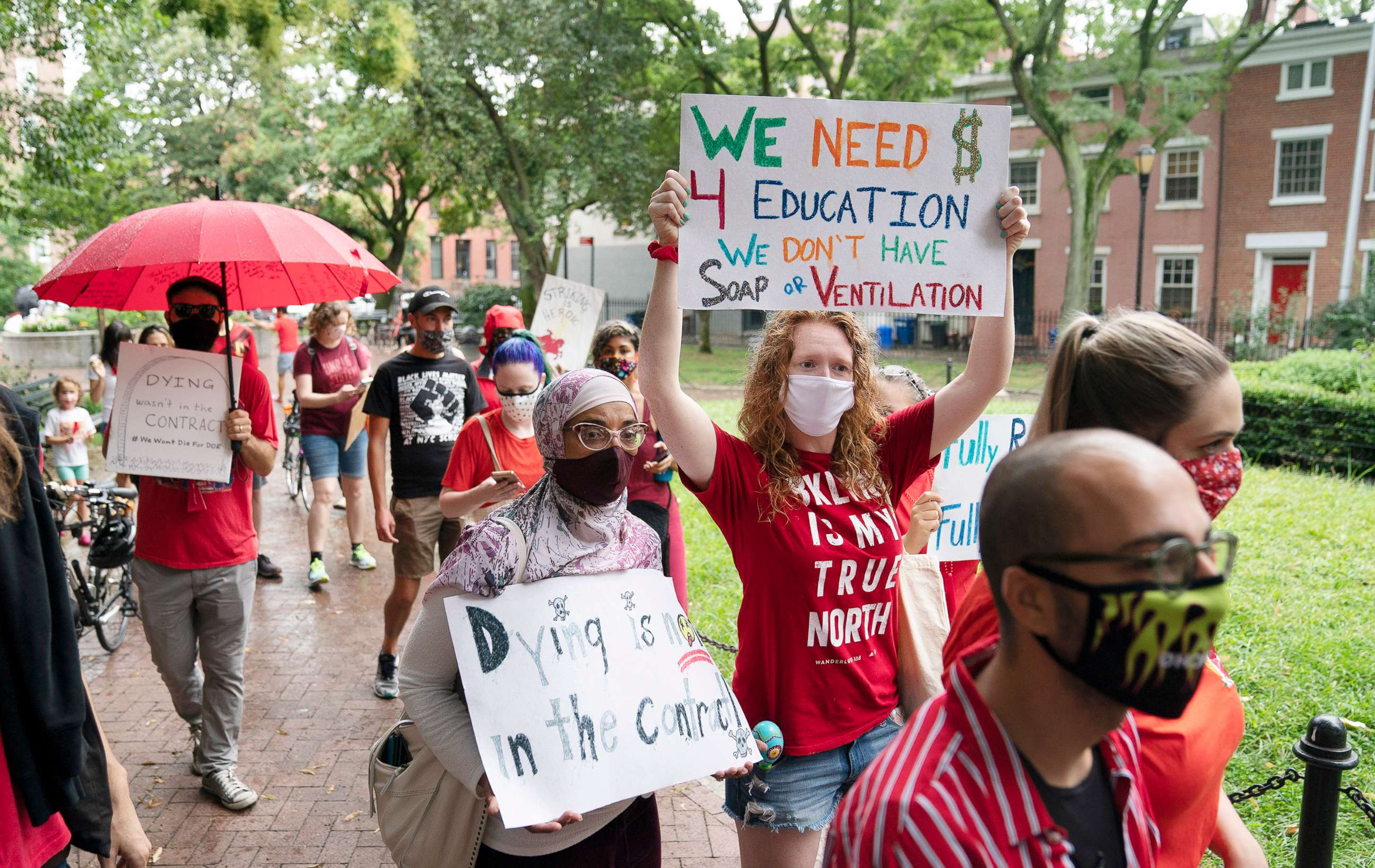 PHOTO: Teachers, parents and children march in the Brooklyn borough of New York to protest the reopening of city public schools amid the threat of a teachers strike, Sept. 1, 2020.