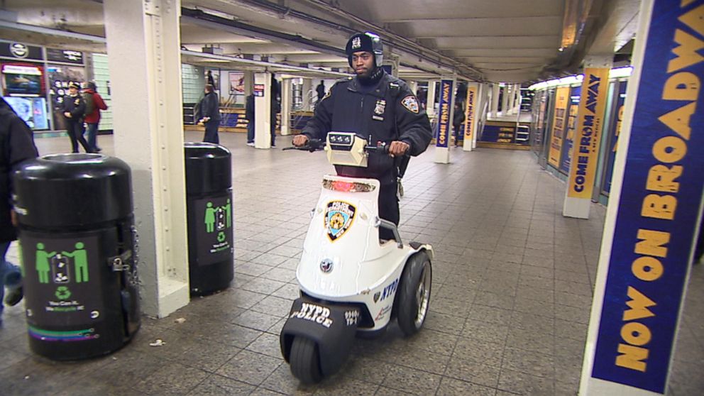 PHOTO: New York police patrol by scooter in the subway station near Times Square, New York. 