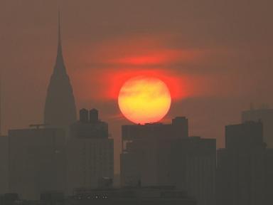 Cities warn of unhealthy air as Canadian wildfires bring smoke to Midwest, Northeast
