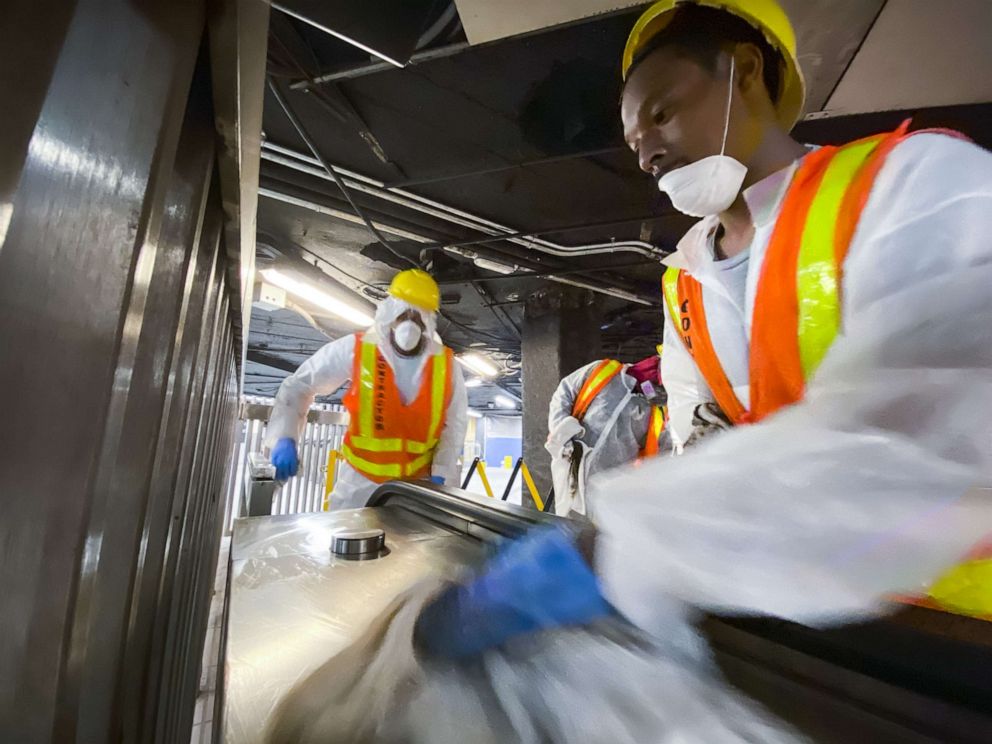 PHOTO: Workers clean Grand Central station as the New York City subway system, the largest public transportation system in the nation is set for nightly cleaning due to the continued spread of the coronavirus on May 5, 2020 in New York.
