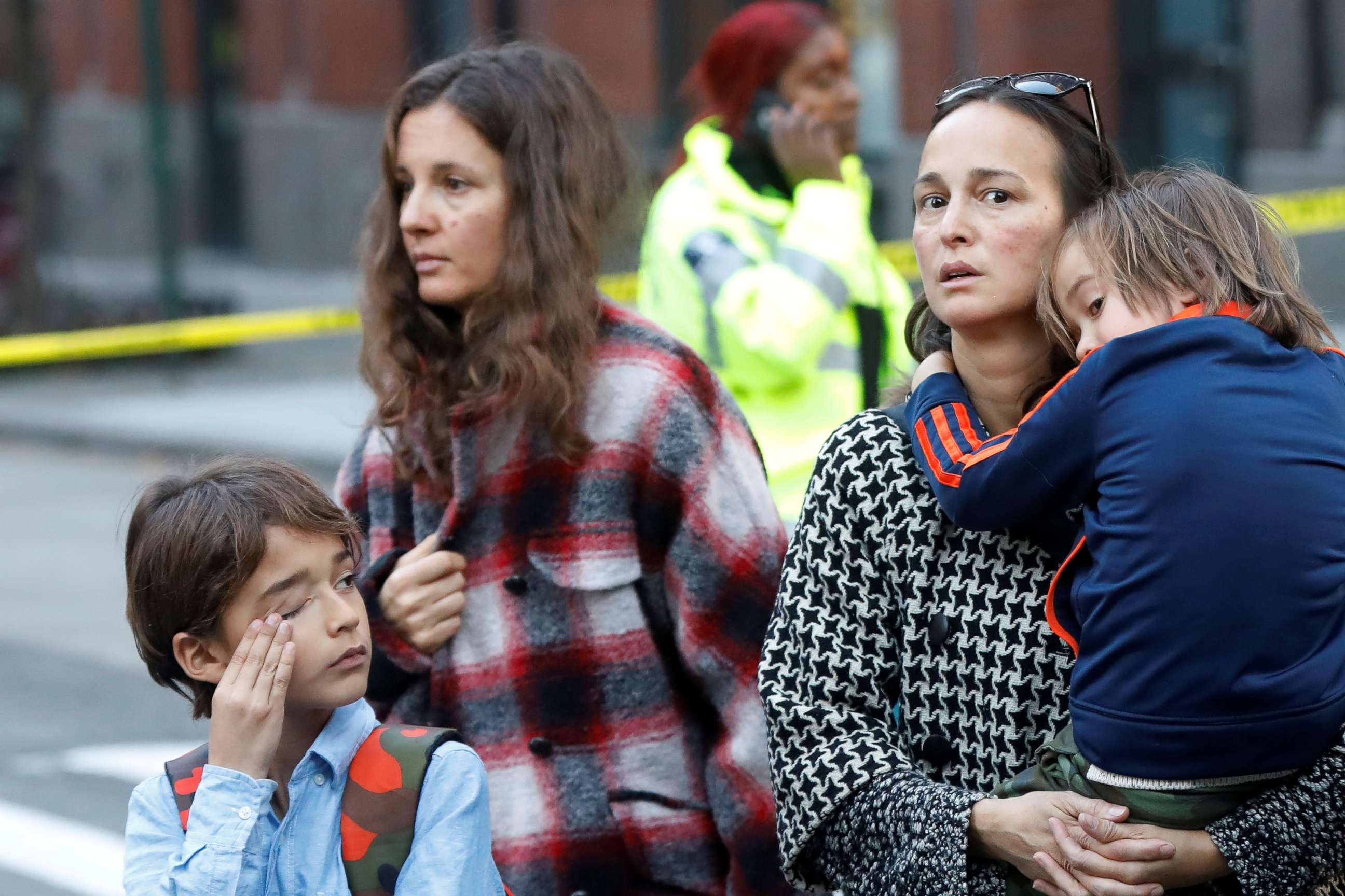 PHOTO: Parents arrive to pick up children outside P.S./I.S.-89 school, after a man driving a rented pickup truck mowed down pedestrians and cyclists on a bike path alongside the Hudson River in New York City, Oct. 31, 2017. 