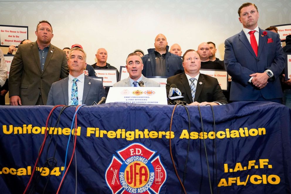 PHOTO: International Association of Fire Fighters President Ed Kelly, center, and FDNY officials appear during a news conference to protest New York City's COVID-19 vaccine mandate, Nov. 2, 2021, in New York.