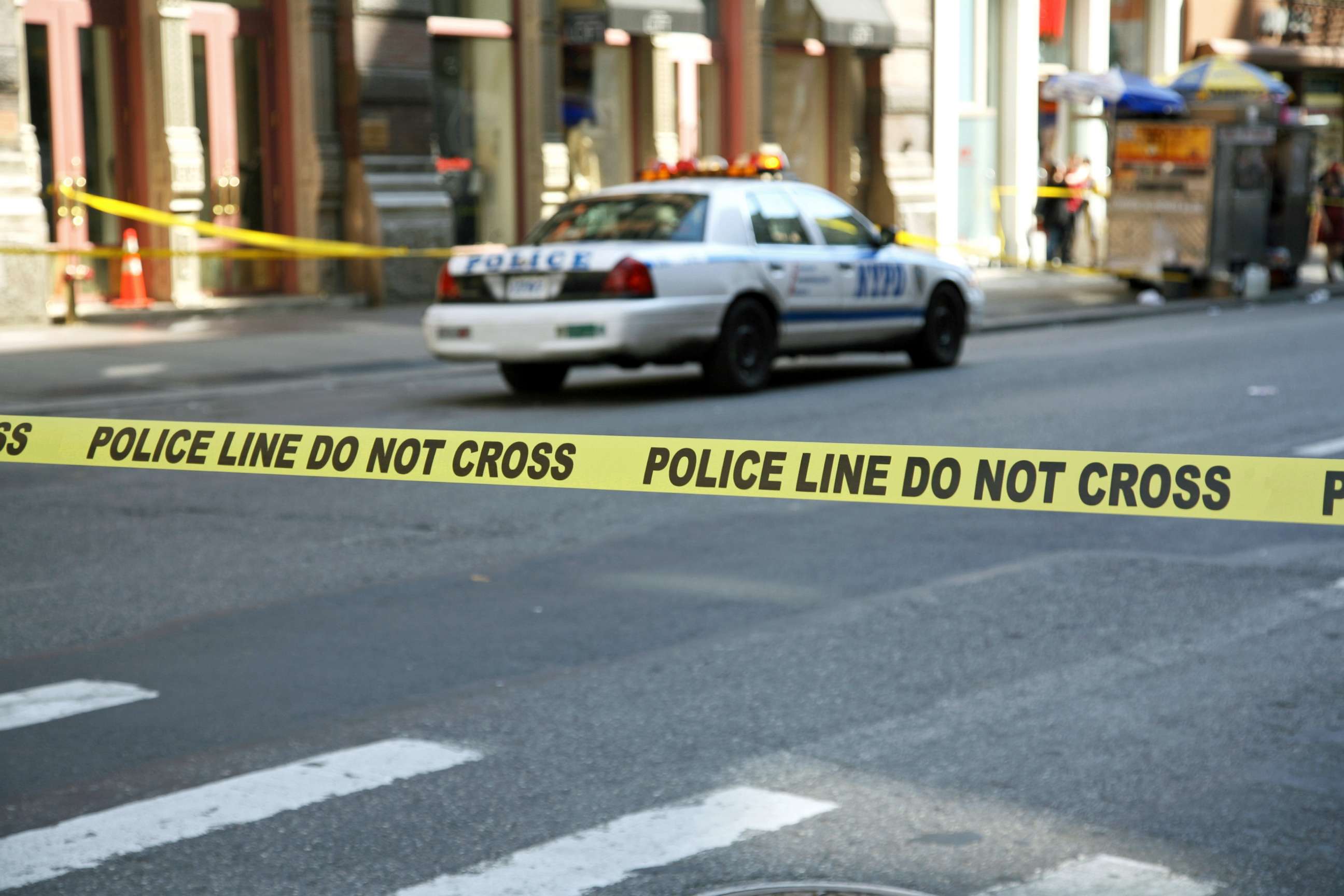 PHOTO: Stock photo of police tape and a police car in New York City.