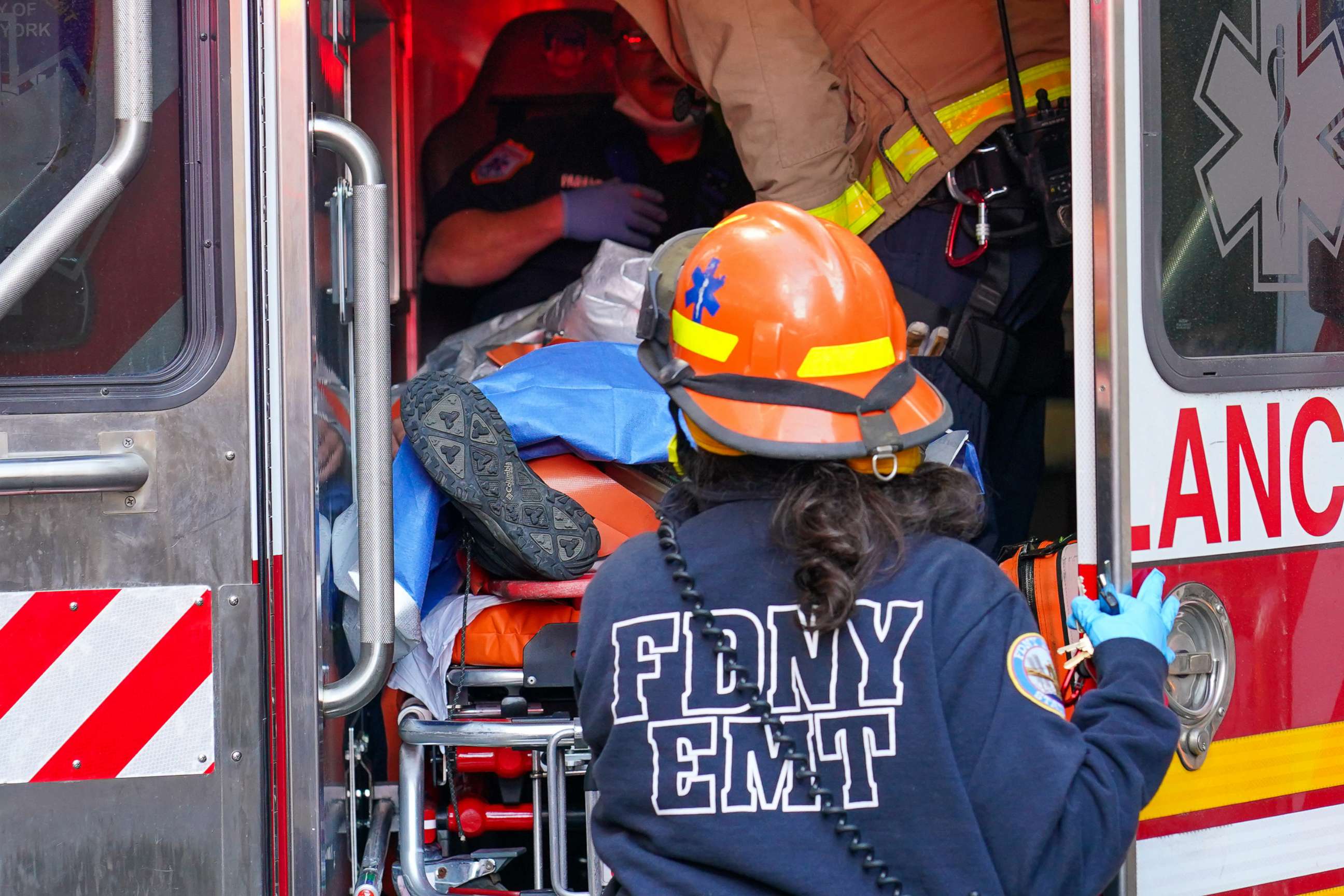 PHOTO: An injured worker is brought to a waiting FDNY ambulance, Nov. 14, 2020.