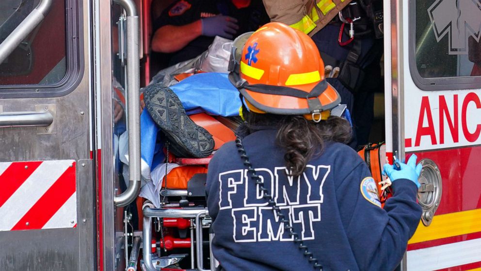 PHOTO: An injured worker is brought to a waiting FDNY ambulance, Nov. 14, 2020.