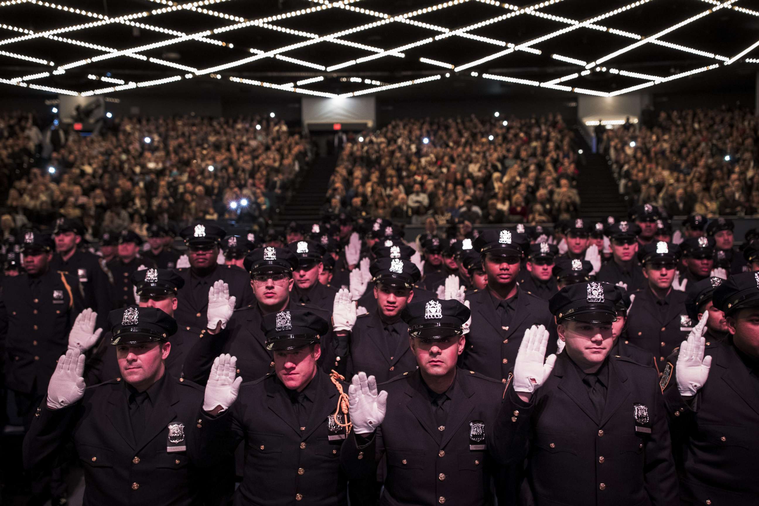 PHOTO: The newest members of the New York City Police Department are sworn-in during their police academy graduation ceremony at the Theater at Madison Square Garden, April 18, 2018 in New York.