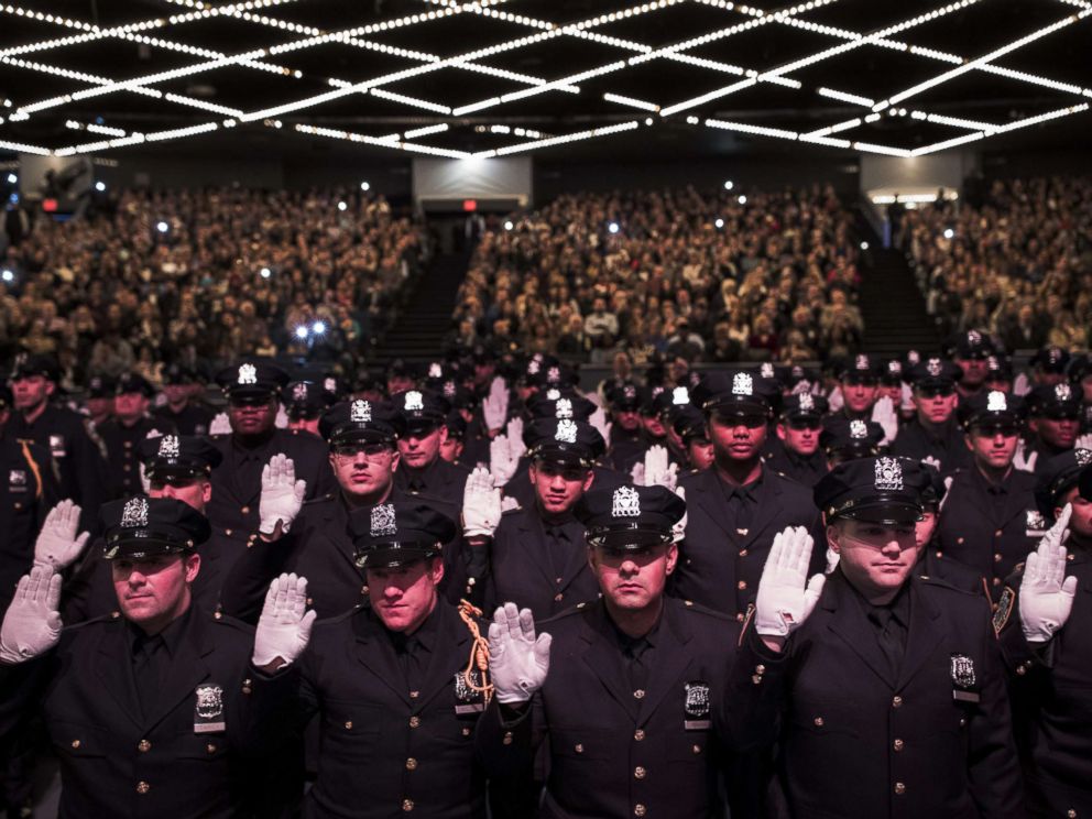 PHOTO: The newest members of the New York City Police Department are sworn-in during their police academy graduation ceremony at the Theater at Madison Square Garden, April 18, 2018 in New York.