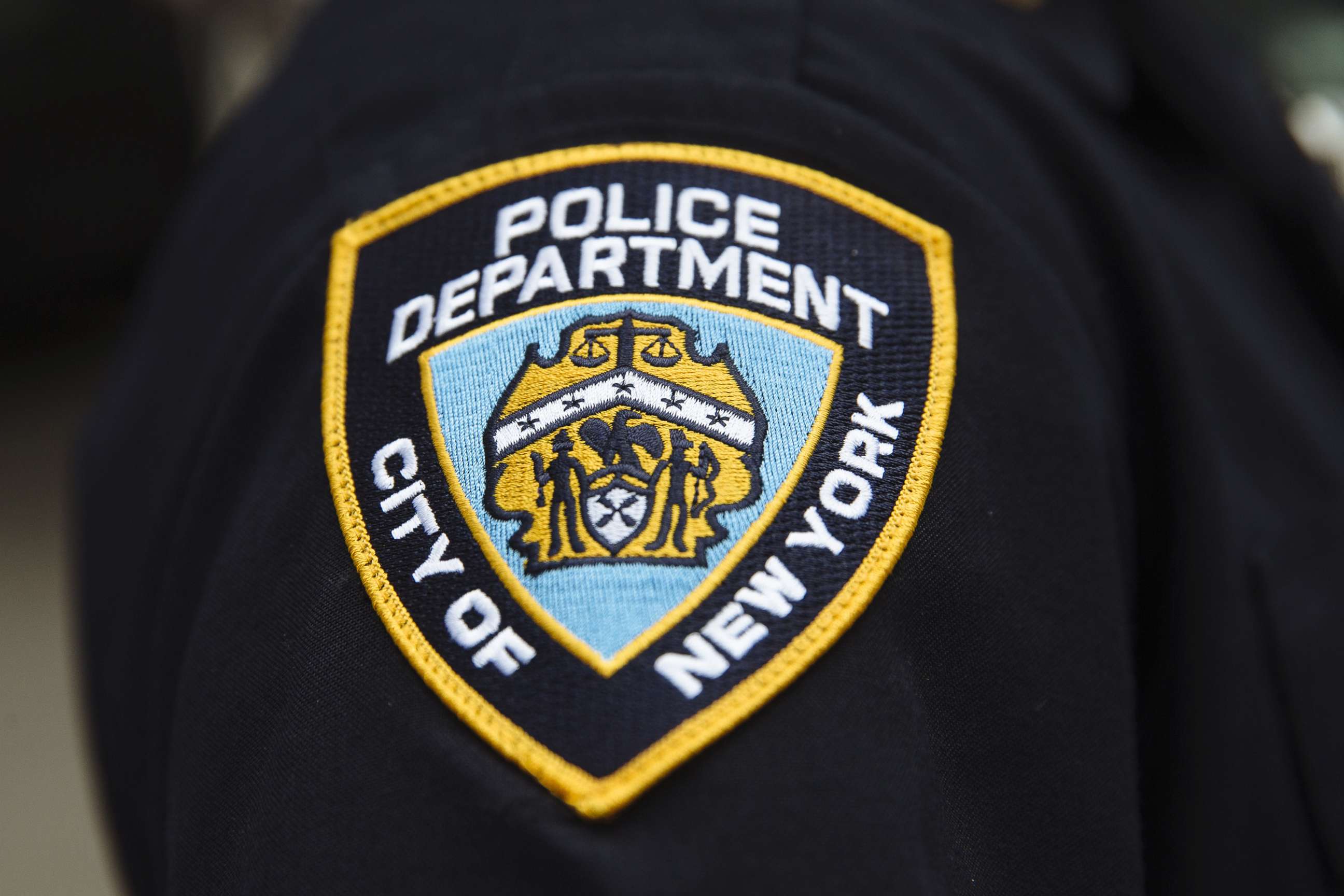 PHOTO: A New York City Police Department (NYPD) patch is seen on an officer's uniform in the Midtown neighborhood of New York, June 17, 2020. 