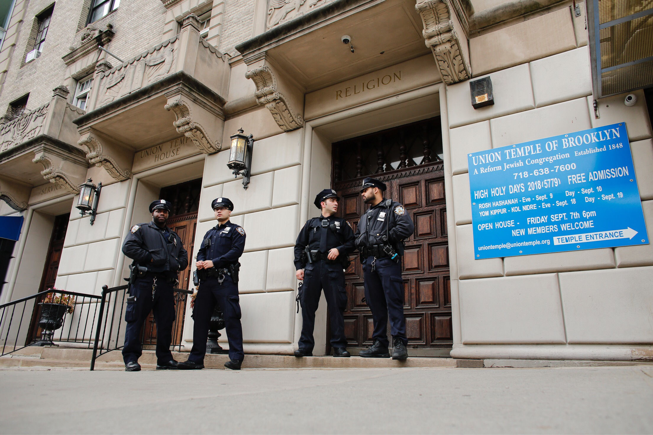 PHOTO: New York Police Department officers stand guard at the door of the Union Temple of Brooklyn on Nov. 2, 2018 in New York City.