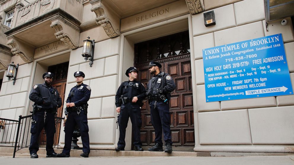 PHOTO: New York Police Department officers stand guard at the door of the Union Temple of Brooklyn on Nov. 2, 2018 in New York City.