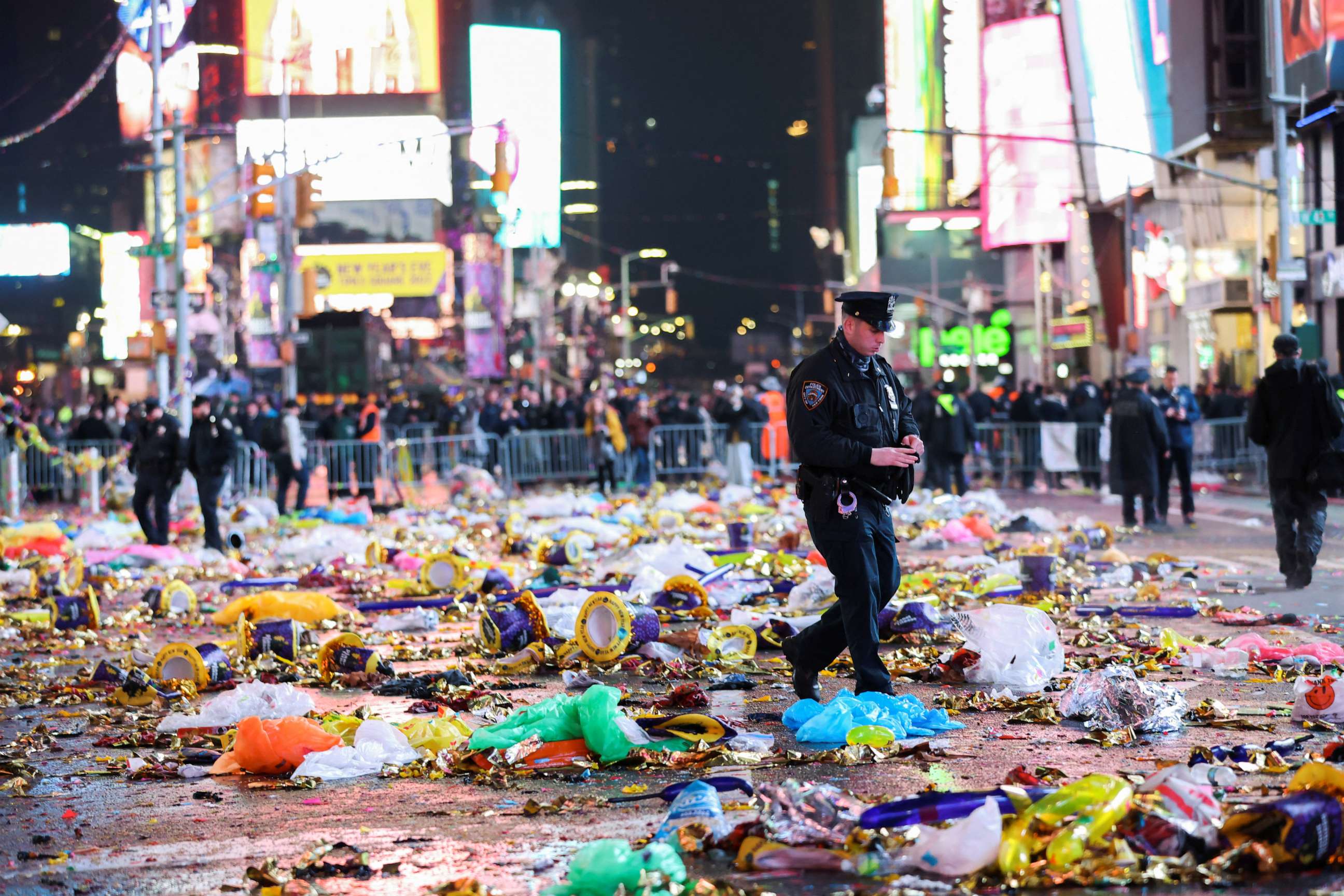 PHOTO: A police officer walks after the first public New Year's event since the COVID-19 pandemic, at Times Square, in New York, Jan. 1, 2023.