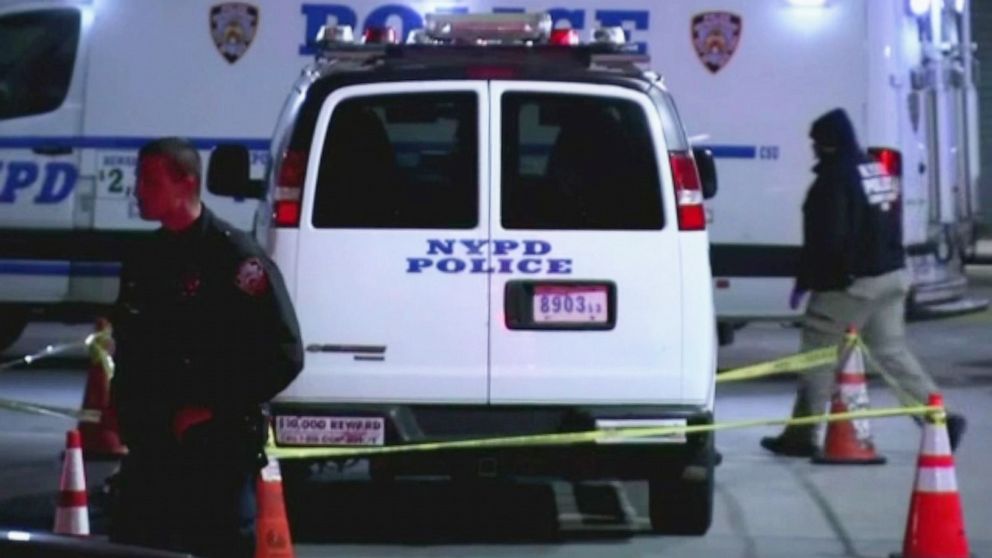 PHOTO: NYPD officers work the scene where a police van was was shot at in the Bronx borough of New York, Feb. 8, 2020.