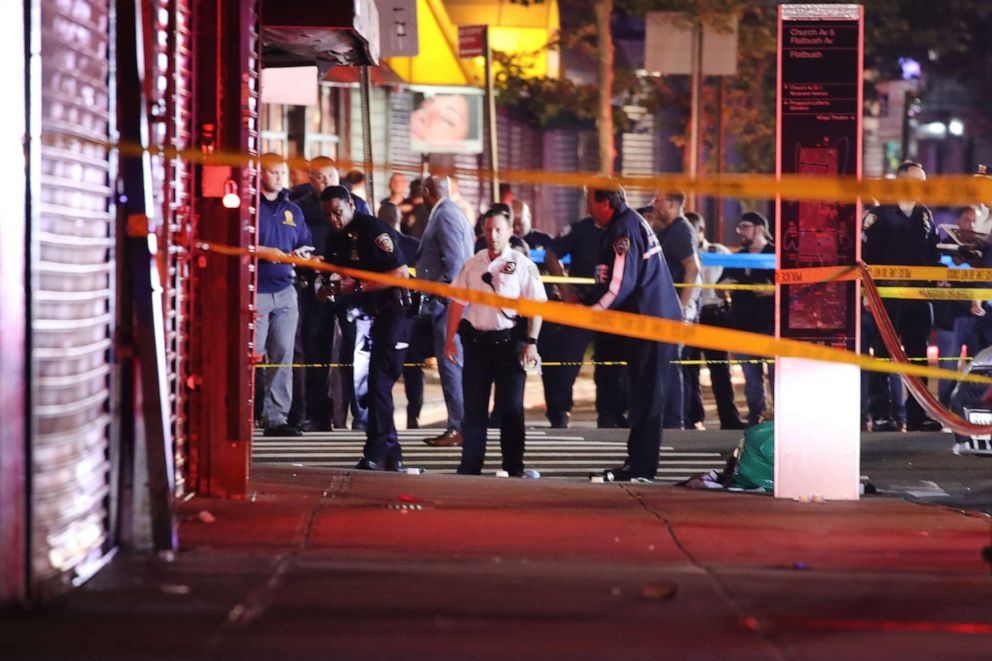 PHOTO: Police gather at the scene where two New York City police officers were shot in a confrontation late Wednesday evening in Brooklyn on June 03, 2020 in New York City.