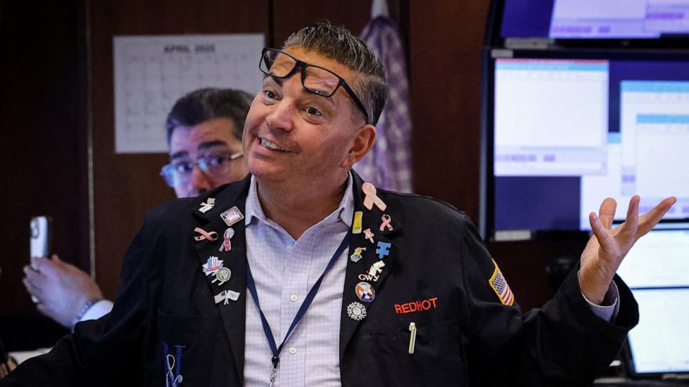 PHOTO: Traders work on the floor at the New York Stock Exchange (NYSE) in New York City, April 9, 2025.