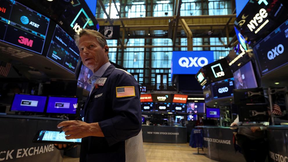 PHOTO: Traders work on the floor at the New York Stock Exchange in New York City, April 30, 2025.