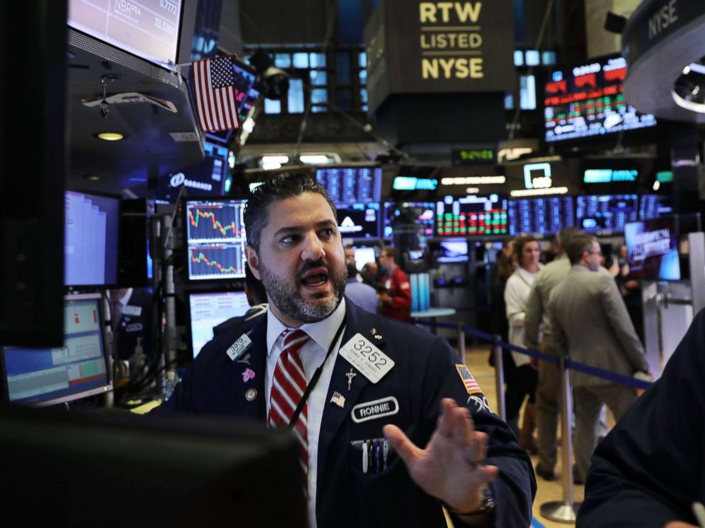 PHOTO: Traders work on the floor of the New York Stock Exchange (NYSE), Nov. 20, 2018, in New York.