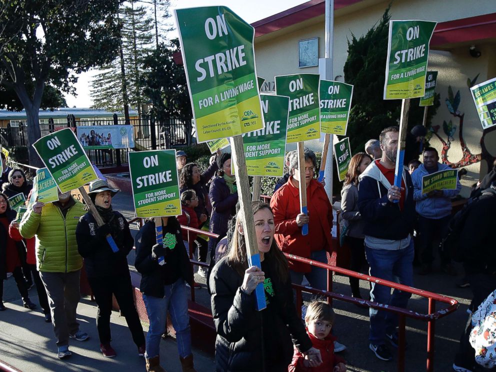 PHOTO: Teachers and supporters march outside of Manzanita Community School in Oakland, Calif., Feb. 21, 2019.
