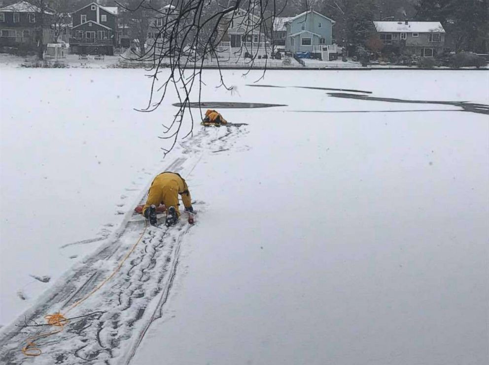 PHOTO: Firefighters from the Oaklyn Fire Department in New Jersey saved a dog who had fallen into a frozen creek behind a home. 