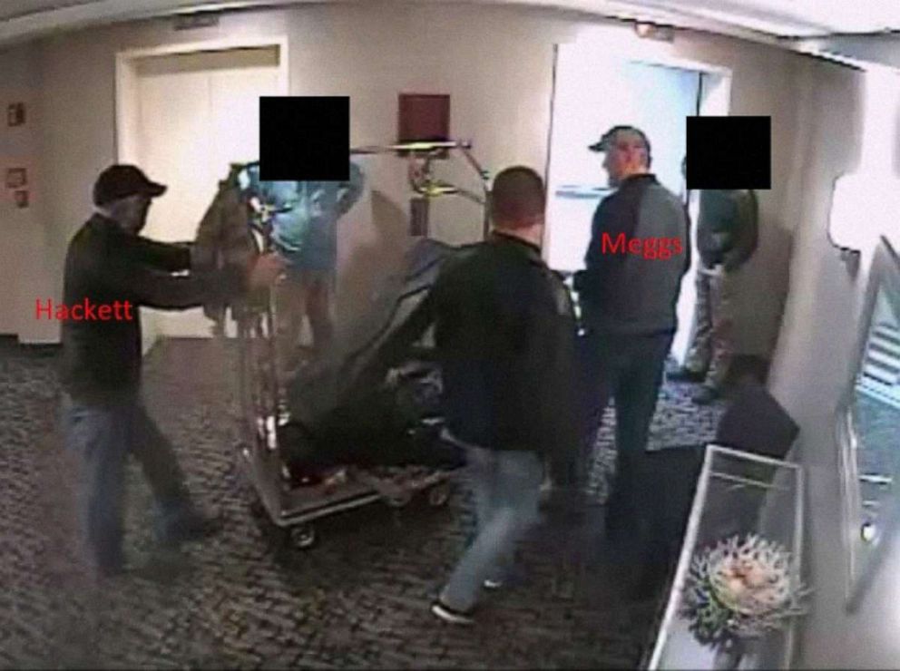 PHOTO: Alleged members of the Oath Keepers militia group are seen in security camera footage from a Virginia hotel with what prosecutors describe as a cache of weapons, in photos included in DOJ's court filings on the Jan. 6 attack on the U.S. Capitol.