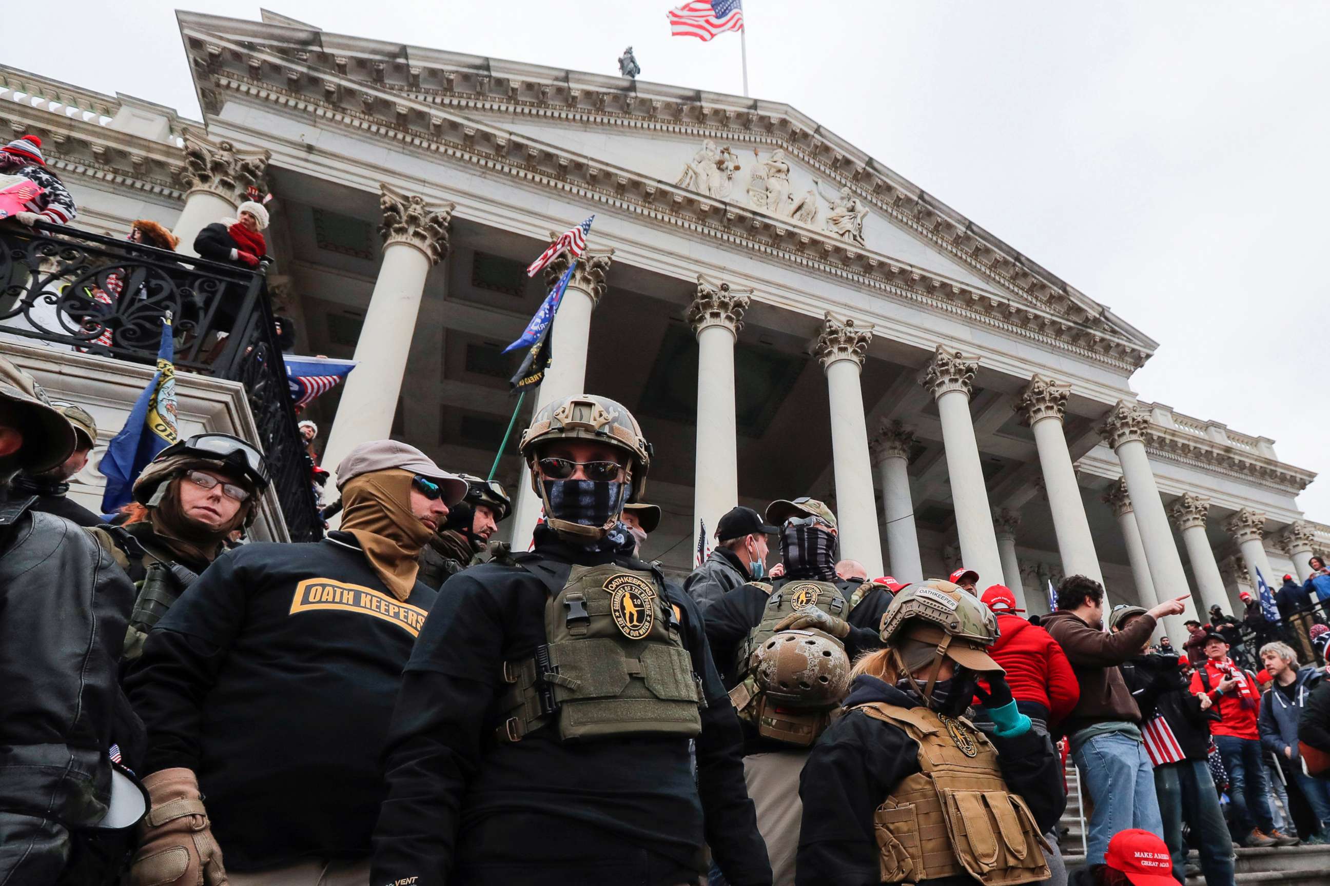 PHOTO: Members of the Oath Keepers militia group, including Jessica Marie Watkins, who has since been indicted by federal authorities for her role in the siege on the Capitol, stand on the east front steps of the U.S. Capitol, Jan. 6, 2021, in Washington.