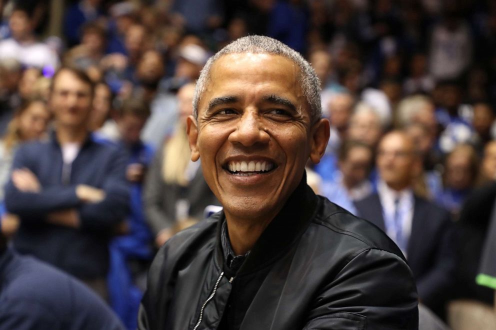 PHOTO: Former President of the United States, Barack Obama, watches on during the game between the North Carolina Tar Heels and Duke Blue Devils at Cameron Indoor Stadium on February 20, 2019 in Durham, North Carolina.