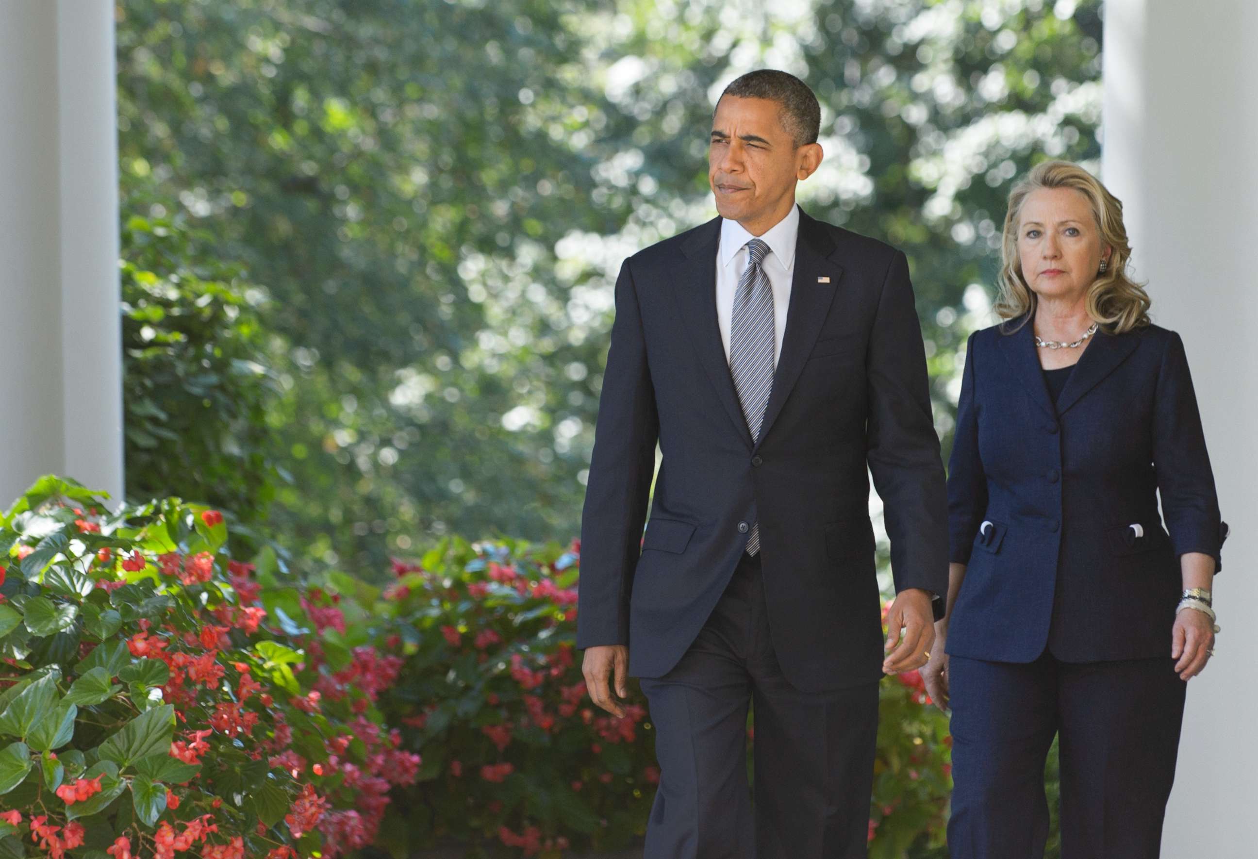 PHOTO: President Barack Obama and Secretary of State Hillary Clinton make their way to deliver a statement in the Rose Garden of the White House, Sept. 12, 2012 in Washington.