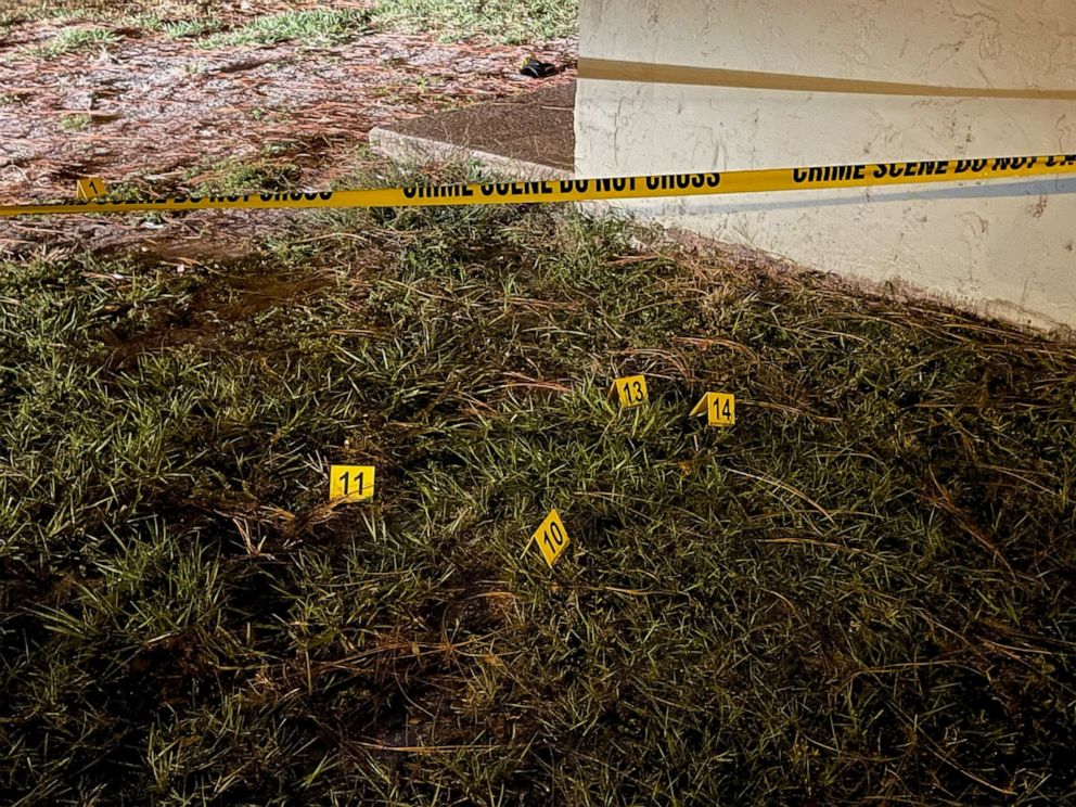 PHOTO: Police officials placed these evidence markers on the ground at an apartment complex that was the scene of a shooting in Ocala, Fla., Oct. 20, 2021.