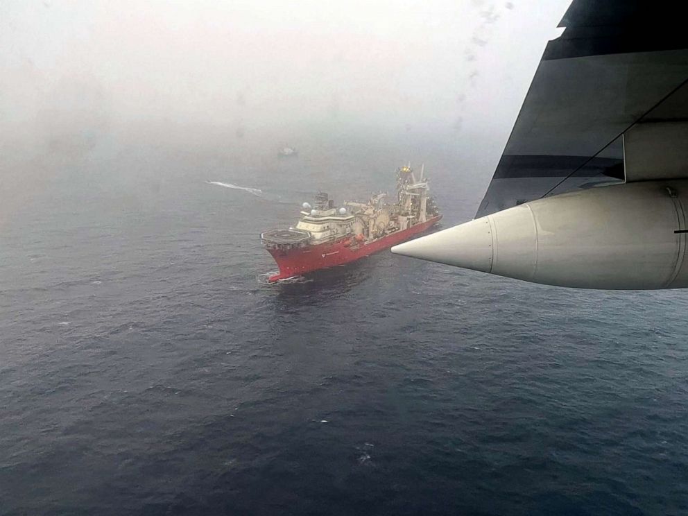 PHOTO: In this June 20, 2023, aerial image obtained from the US Coast Guard, the ship Deep Energy sails in the search area for OceanGate's Titan submersible.