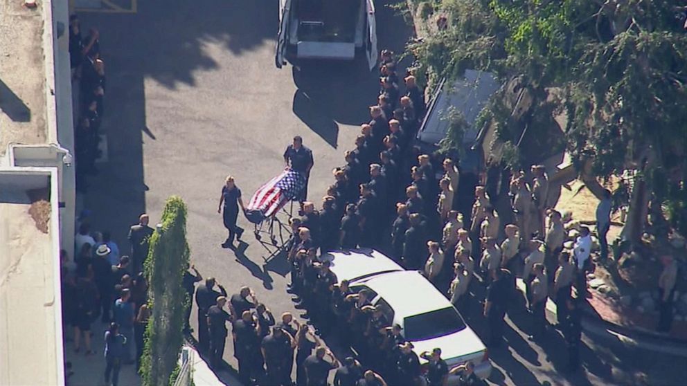 PHOTO: The body of Los Angeles Police Officer Juan Diaz is transported after he was shot and killed while off-duty, July 27, 2019. 