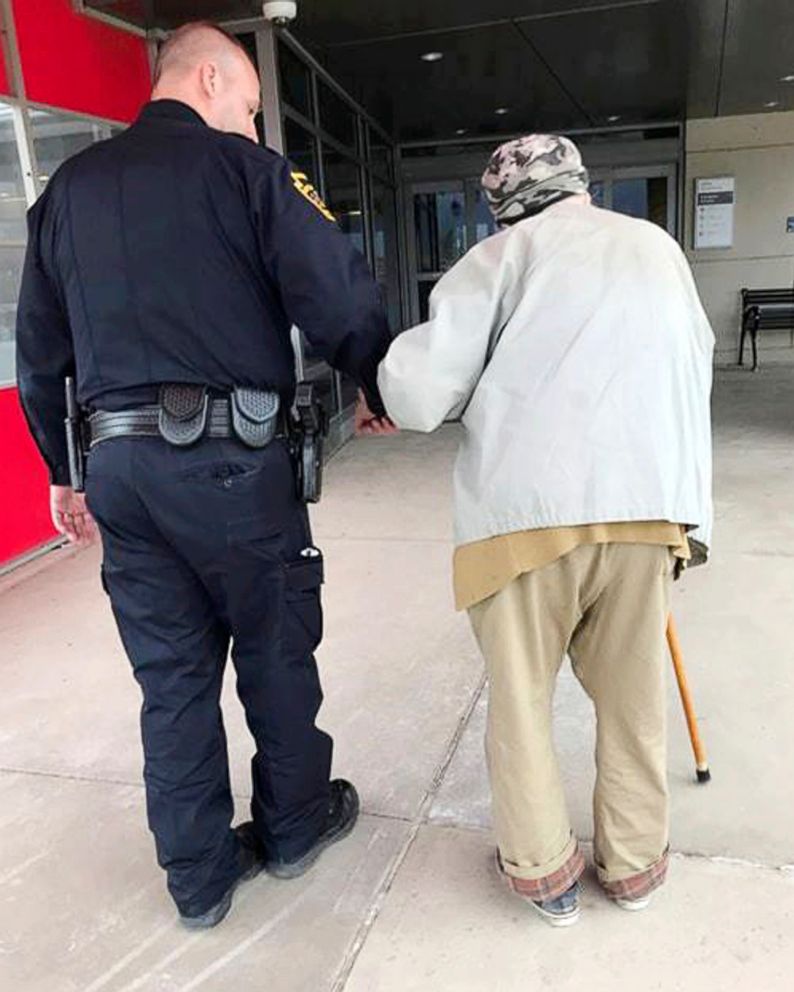 PHOTO: Jason Bentley, left, deputy chief of the department, escorts an 84-year-old man to see his wife, also 84, in the emergency department of UPMC Susquehanna hospital in Williamsport, Pa.