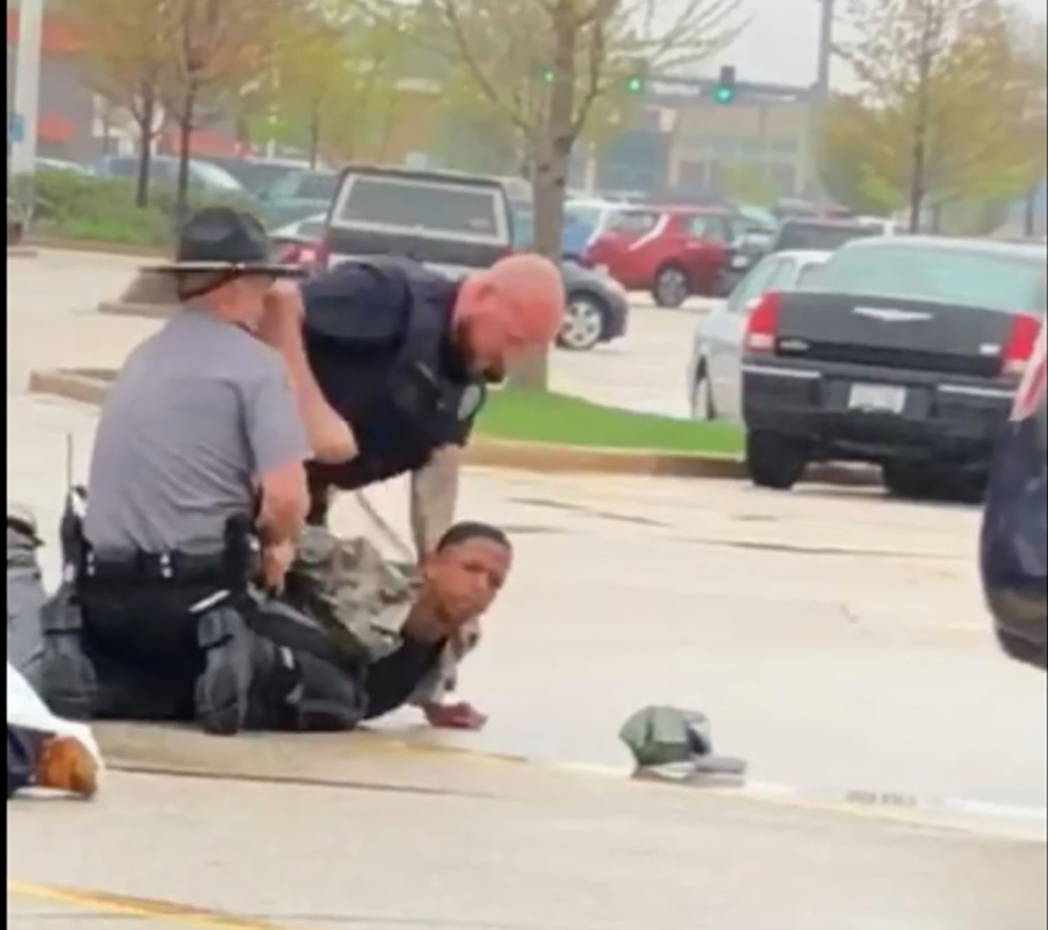 PHOTO: Video footage of an encounter between a Wisconsin police officer and a teen, in which the officer’s allegedly punched the teen multiple times in the head while trying to arrest him at the Mayfair Mall parking lot in Wauwatosa, Wis., May 11, 2018.