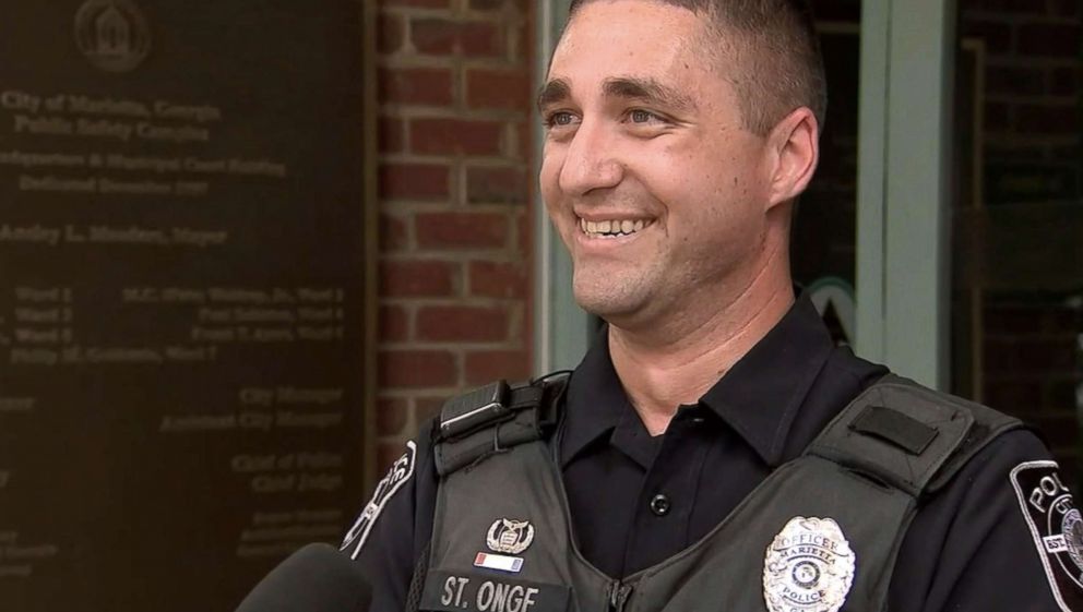 PHOTO: Georgia police officer Nick St. Onge is being called a hero after he used CPR to save a choking baby in Marietta, May 15, 2018.