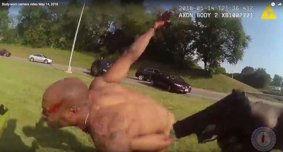 A still image taken from a police body camera shows a police officer pointing his gun at Marcus-David Peters on May 14, 2018, in Richmond, Va. 