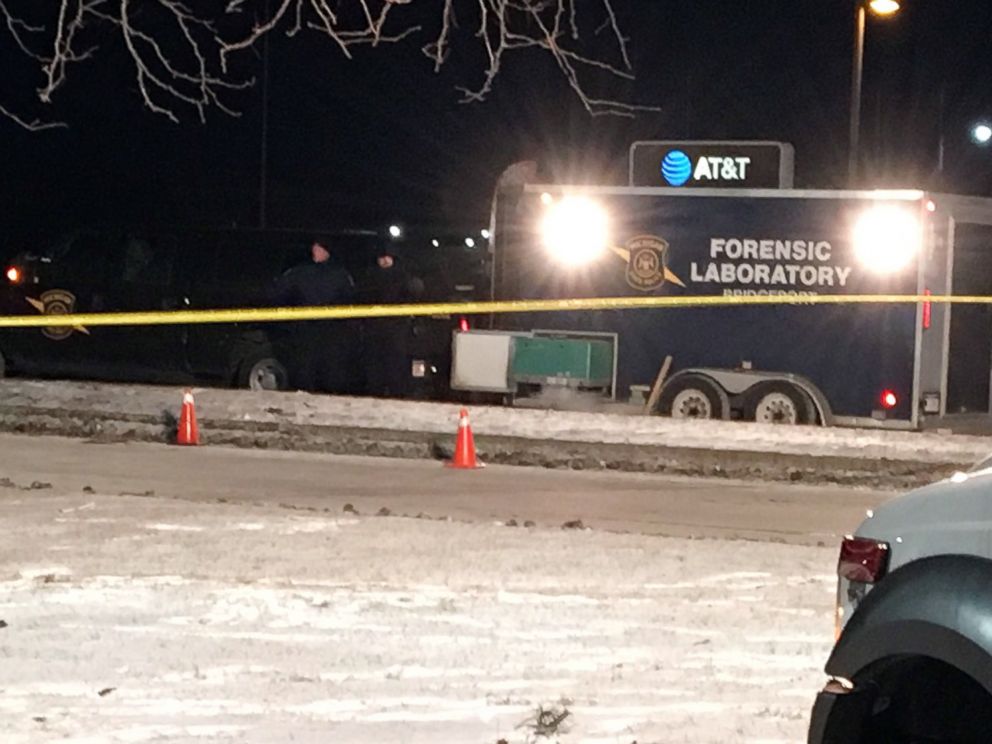 PHOTO: Investigators are pictured at the scene in Saginaw Township, Mich., where a police officer was shot during a traffic stop early on Jan. 22, 2019.