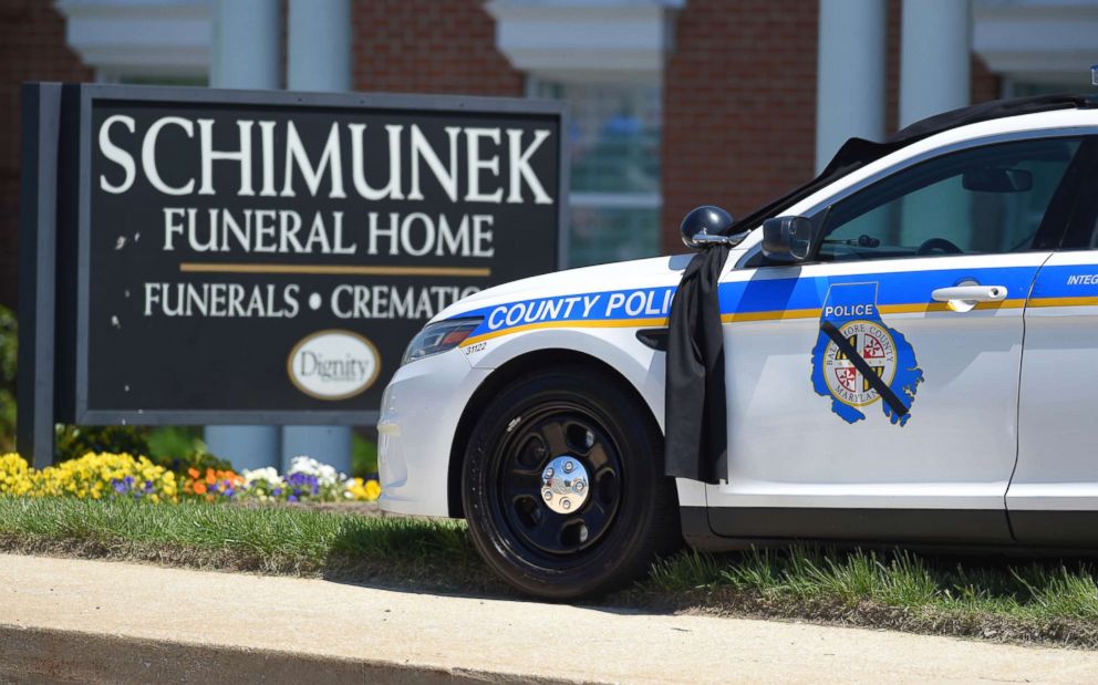 PHOTO: A Baltimore County police car draped in black is parked outside the Schimunek Funeral Home for the viewing of slain Baltimore County police officer Amy Caprio in Nottingham, Md., May 24, 2018.