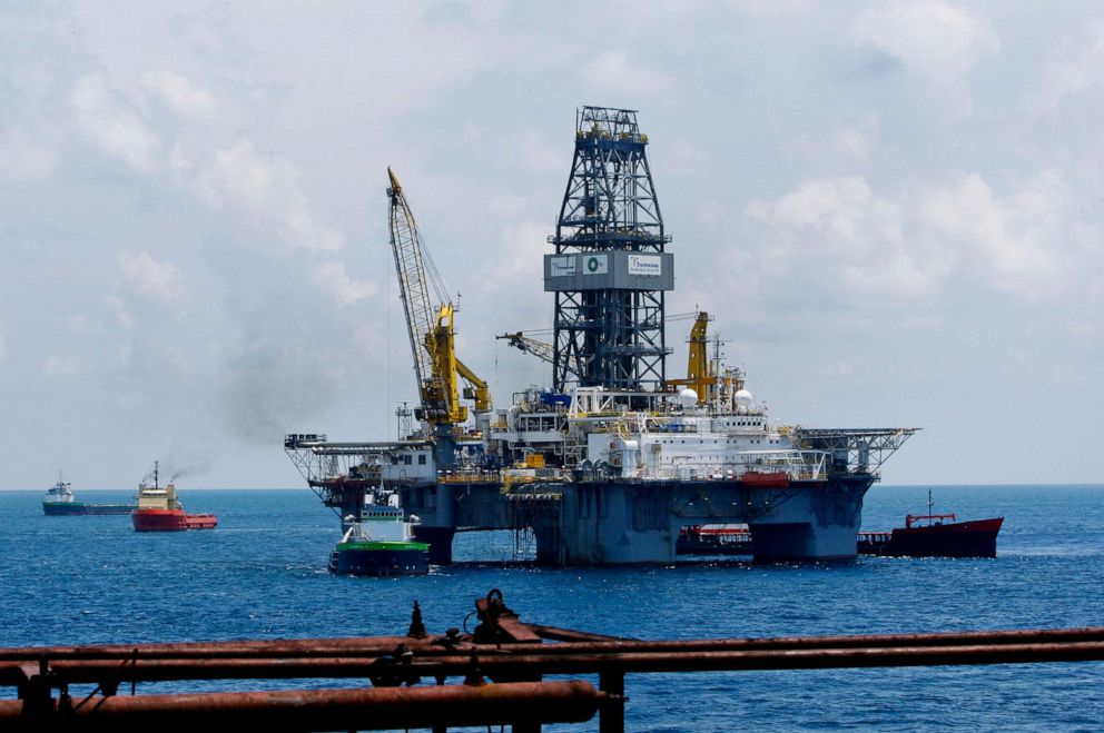 PHOTO: Transocean Ltd.'s Development Driller III rig works to drill a primary relief well as seen from the deck of the Development Driller II rig at the BP Plc Macondo site in the Gulf of Mexico off the coast of Louisiana, Aug. 7, 2010.