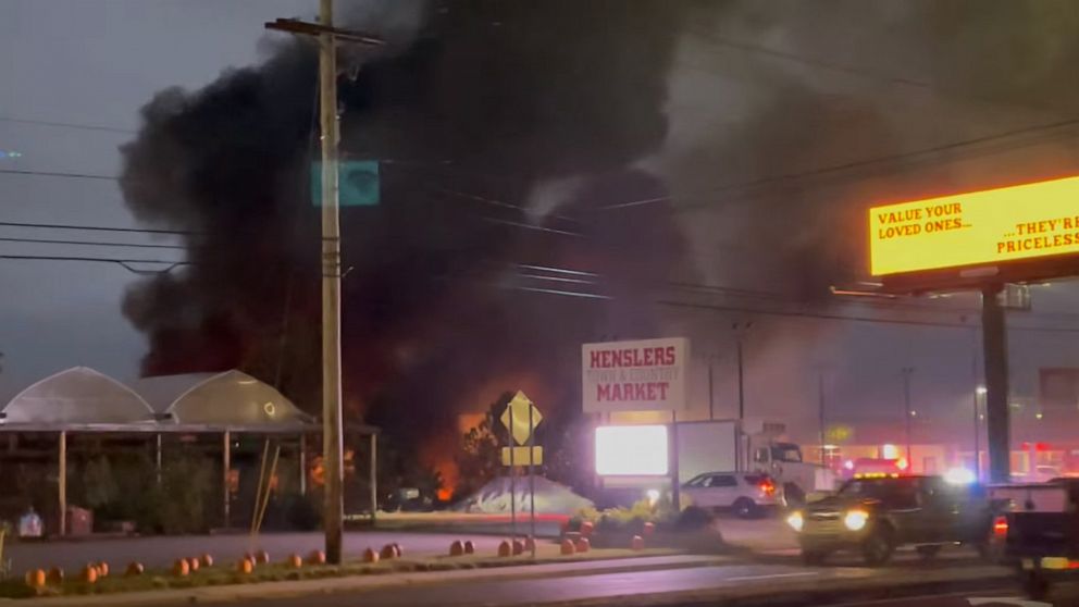 PHOTO: Smoke and fire is seen at the scene were a plane crashed into Summers car dealership in Marietta, OH, in an image shared via Facebook.