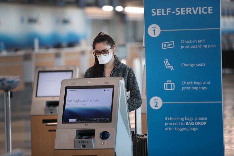 PHOTO: A traveler checks in for a flight at O'Hare International Airport on April 2, 2020 in Chicago.