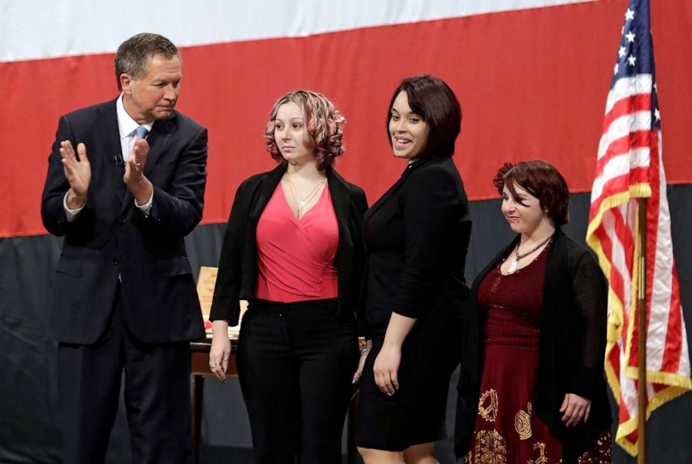 PHOTO: Ohio Gov. John Kasich, from left, introduces Amanda Berry, Gina DeJesus and Michelle Knight during his State of the State address at the Performing Arts Center Monday, Feb. 24, 2014, in Medina, Ohio.
