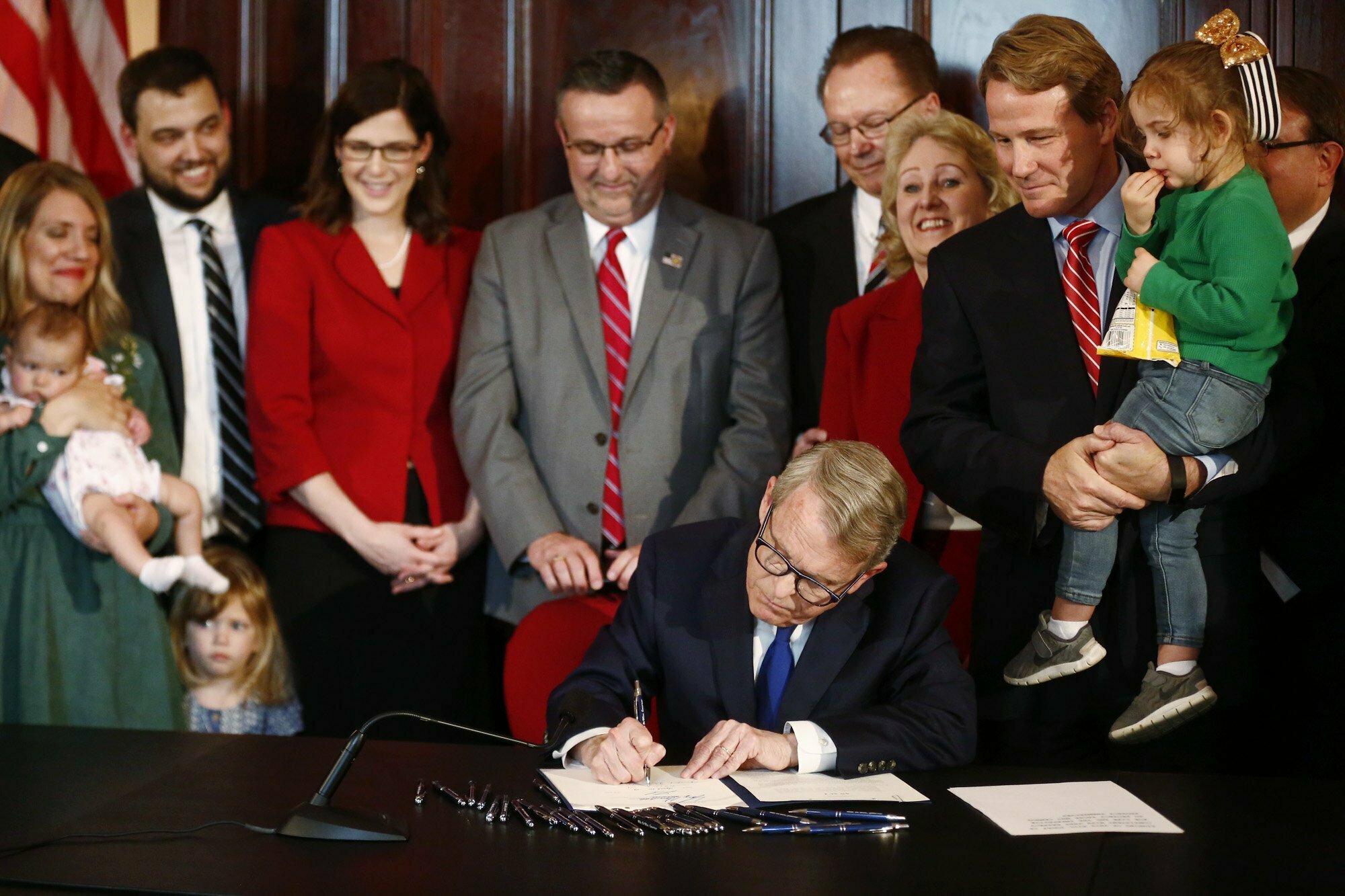 PHOTO: Gov. Mike DeWine speaks before signing a bill imposing one of the nation's toughest abortion restrictions, April 11, 2019 in Columbus, Ohio.