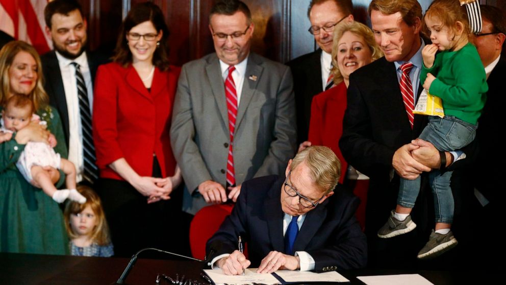 PHOTO: Gov. Mike DeWine speaks before signing a bill imposing one of the nation's toughest abortion restrictions, April 11, 2019 in Columbus, Ohio.