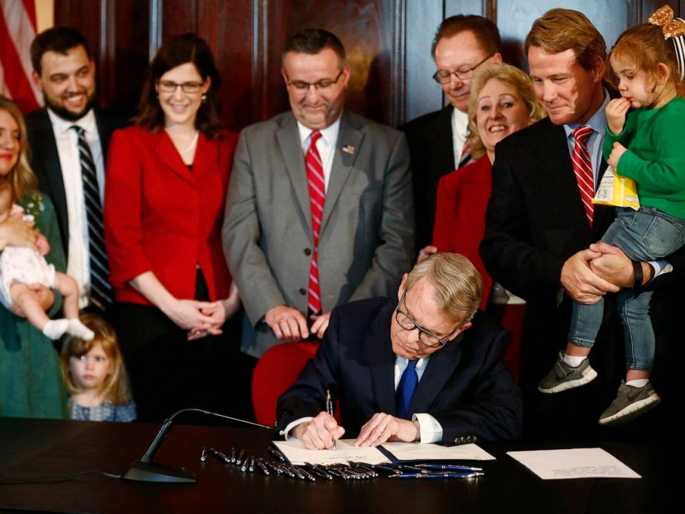 PHOTO: Gov. Mike DeWine speaks before signing a bill imposing one of the nations toughest abortion restrictions, April 11, 2019 in Columbus, Ohio.