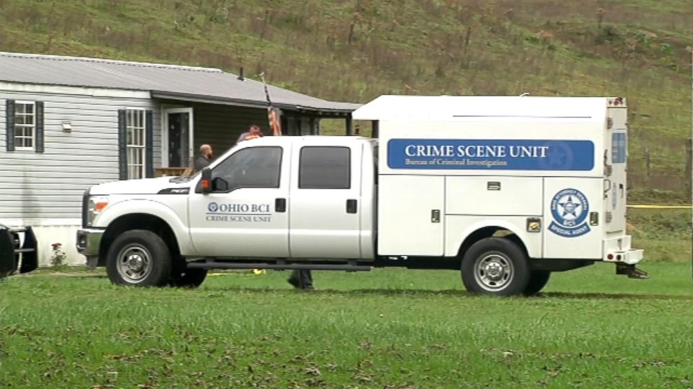PHOTO: A truck investigating the crime scene is parked in front of the home in Lawrence County, Ohio. 