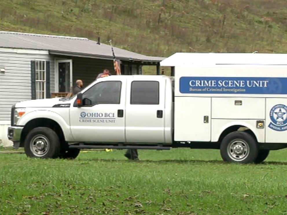 PHOTO: A truck investigating the crime scene is parked in front of the home in Lawrence County, Ohio.