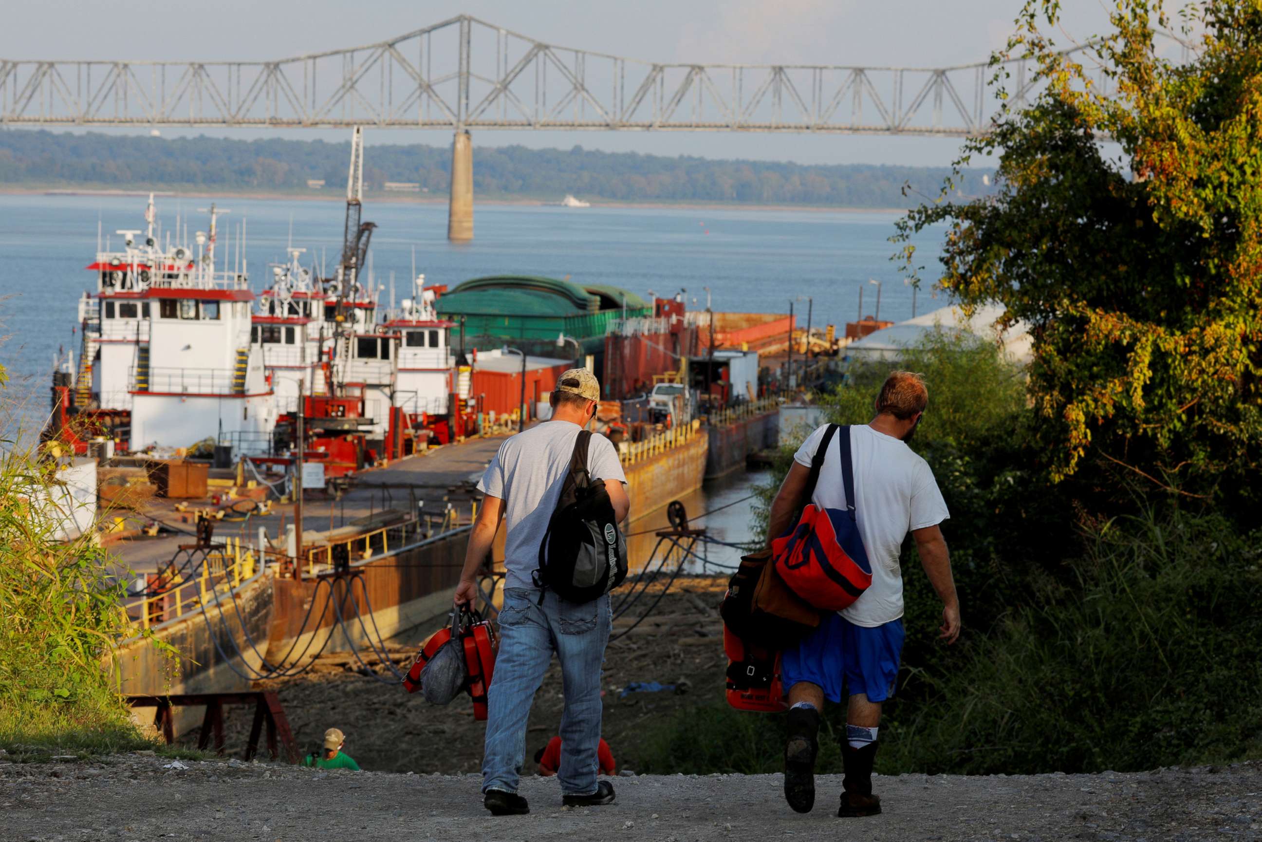 PHOTO: Crew members arrive to work the night shift on tugboats at CGB-Waterfront Marine Service in Cairo, Ill., on Sept. 19, 2017. Cairo sits at the end of the Ohio River, where it flows into the Mississippi River. 