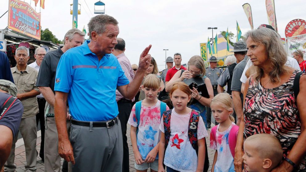PHOTO: Ohio Gov. John Kasich talks with fairgoers while he tours the Ohio State Fair, Thursday, July 27, 2017, in Columbus, Ohio.