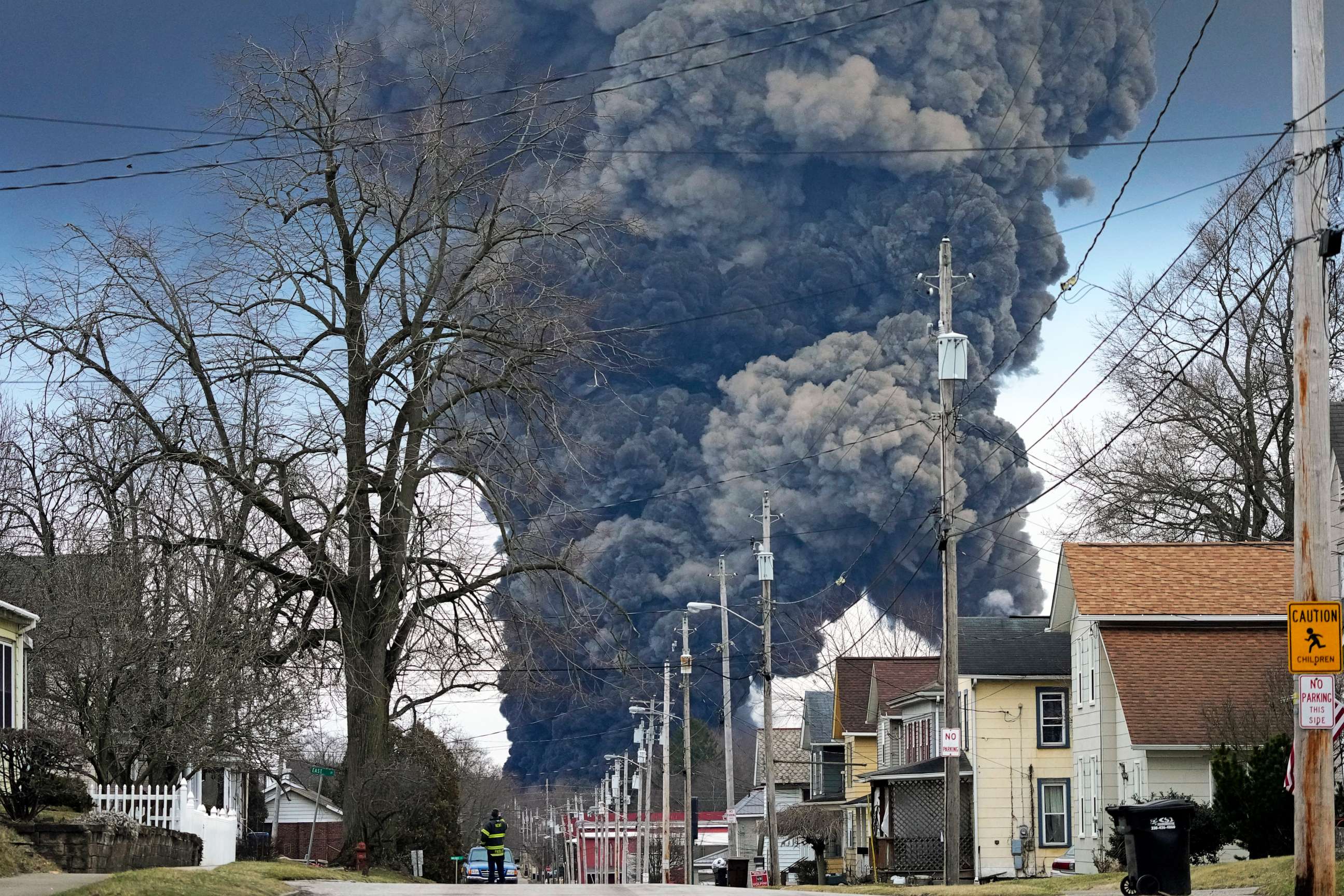 PHOTO: A black plume rises over East Palestine, Ohio, as a result of the controlled detonation of a portion of the derailed Norfolk Southern Railway train on Feb. 6, 2023.