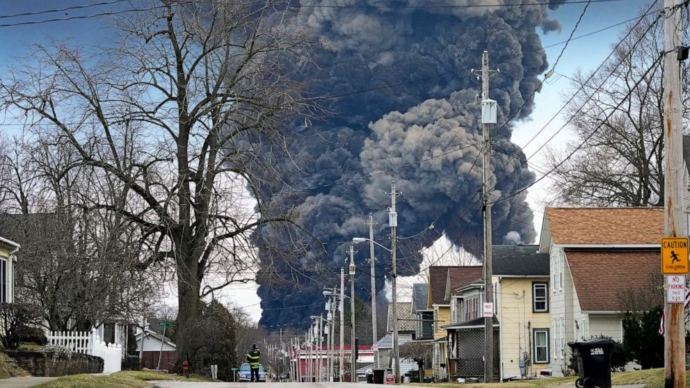 PHOTO: A plume of black smoke rises over East Palestine, Ohio, as a result of the controlled detonation of a portion of the derailed Norfolk Southern Railway train on Feb. 6, 2023.