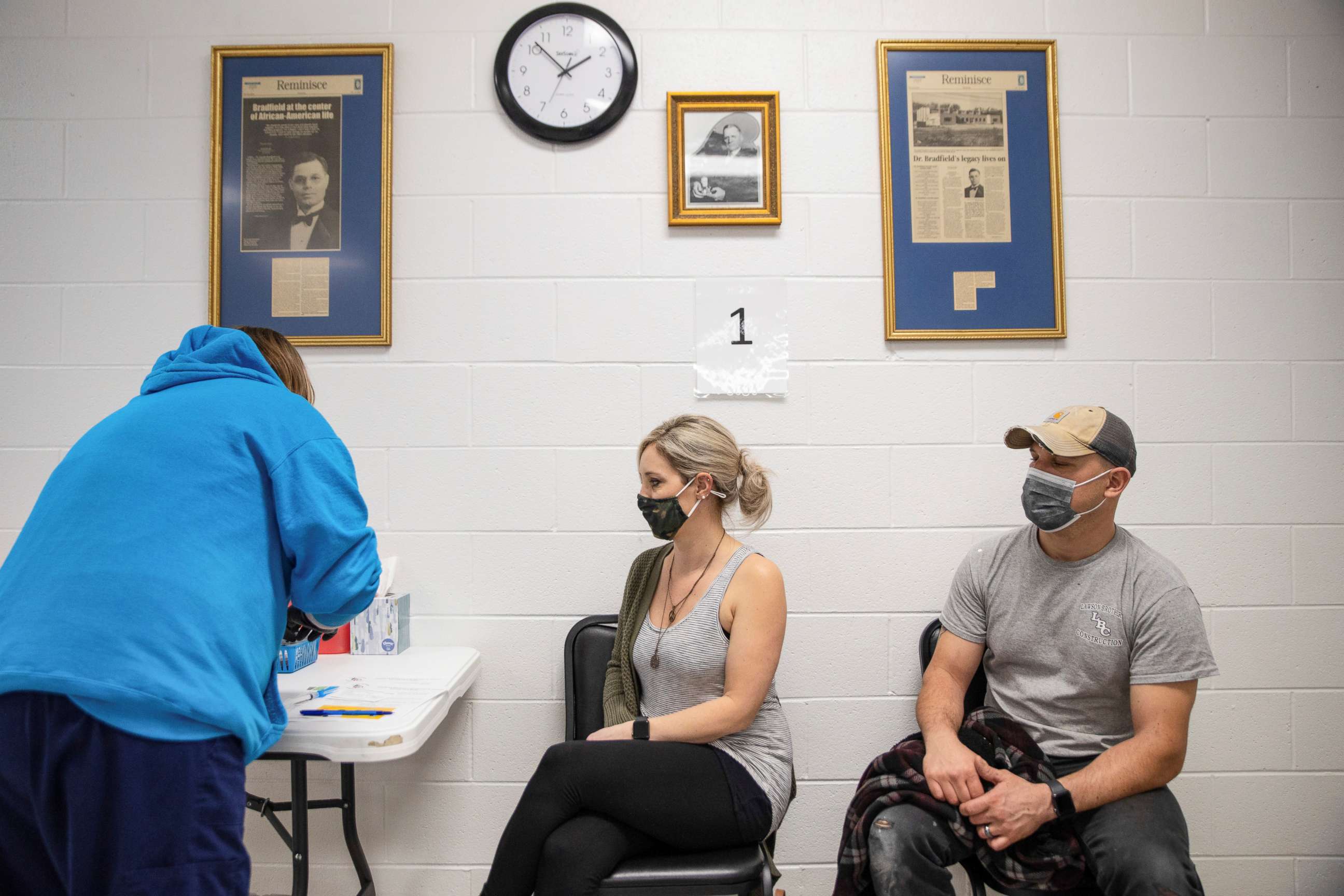 PHOTO: Stefanie Dunahay and Matt Dunahay wait to receive their coronavirus disease (COVID-19) vaccine at the Bradfield Community Center through Health Partners of Western Ohio in Lima, Ohio, March 29, 2021.